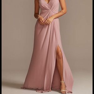 Brand New David’s Bridal dress size 14 color is quartz.